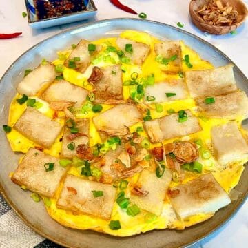 Bánh bột chiên, crispy Vietnamese fried rice cakes with egg and green onions, served with dipping sauce